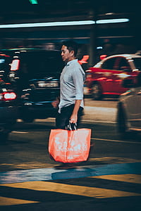panning photography of man running on street thumbnail