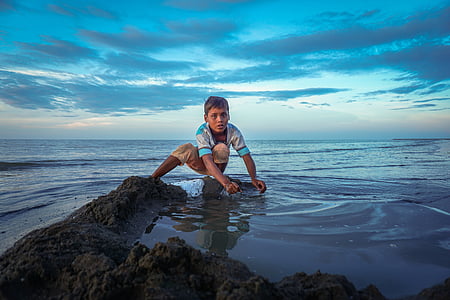 boy on body of water thumbnail