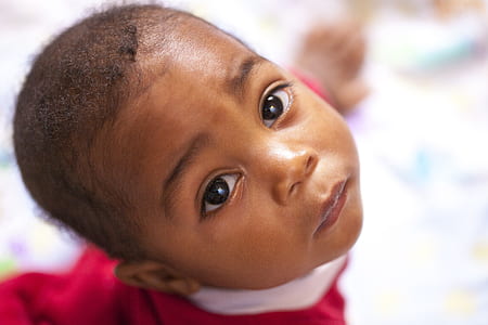 baby wearing red and white dress thumbnail