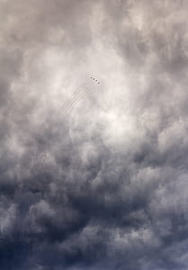 flying jets under white clouds thumbnail