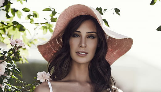 woman wearing pink hat looking fierce thumbnail