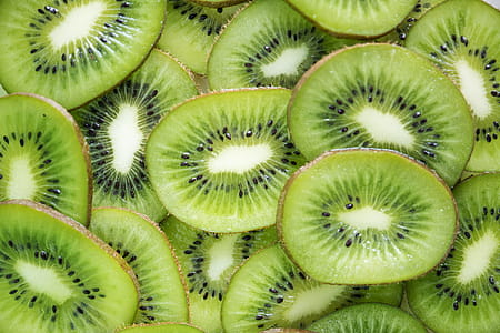 Close-Up Photography of Sliced Kiwi Fruits thumbnail