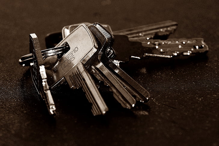 silver key on surface
