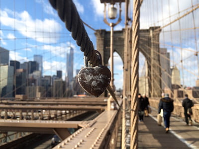 black heart padlock on black cable in Brooklyn Bridge at daytime thumbnail