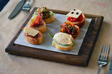 sushi on brown wooden board thumbnail