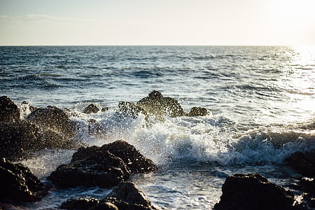 ocean waves crashing to the rocks thumbnail