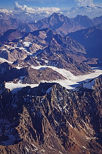 high angle photography of mountain covered with snow thumbnail