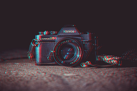 pop-art effect black Konica DSLR camera thumbnail