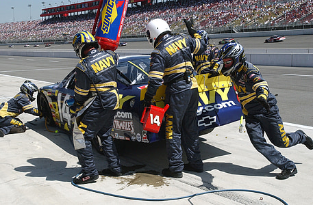NASCAR racing vehicle during pit stop thumbnail
