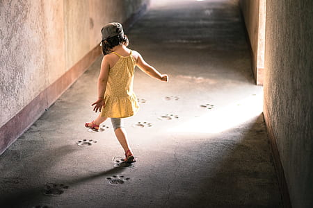 children playing in tunnel during daytime thumbnail