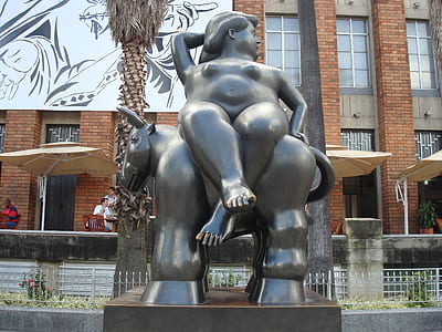 statue of a person sitting on a donkey thumbnail