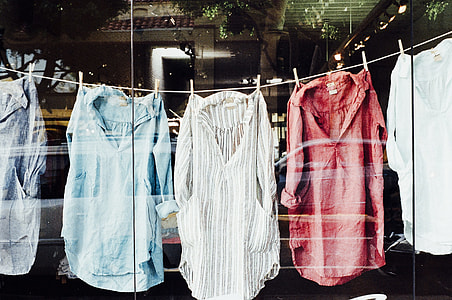 stack clothes clipped on clothesline thumbnail