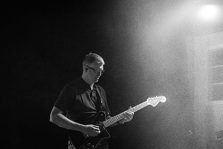 person playing guitar thumbnail