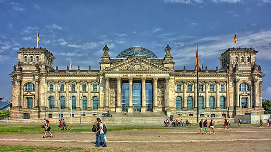 people near brown concrete castle during daytime thumbnail