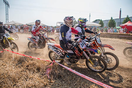 group of people racing using motorcycle thumbnail