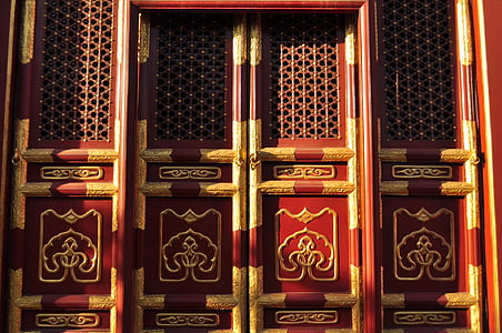 closed brown and red wooden door thumbnail