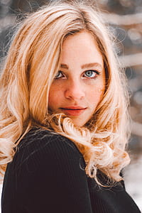 woman wearing black sweater thumbnail