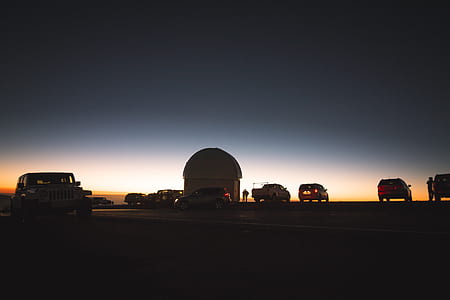 silhouette of vehicles and house during golden hours thumbnail