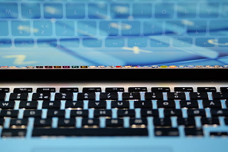 MacBook Pro with blue wallpaper thumbnail