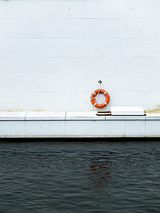 orange and white hanging safety buoy thumbnail