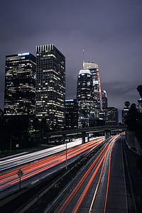 timelapse photograph of vehicle on road thumbnail