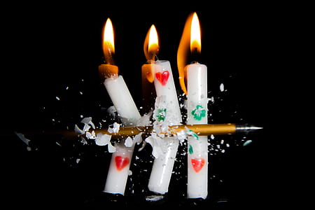 thee slices of lighted candles thumbnail