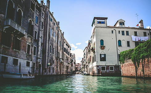body of water between buildings thumbnail
