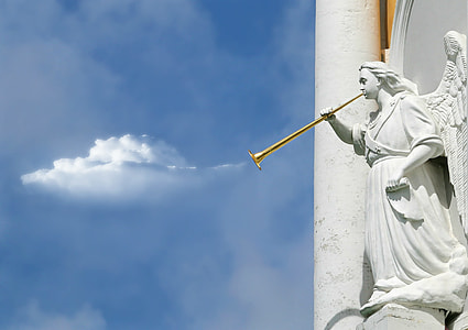 angel statue with brass wind instrument thumbnail