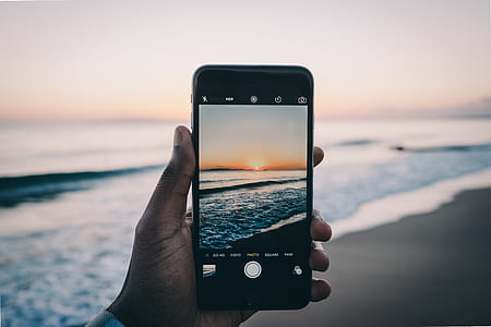 photography of seashore during sunset thumbnail