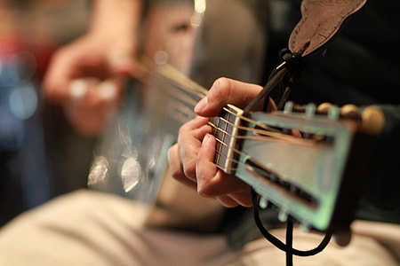 person playing classical guitar thumbnail