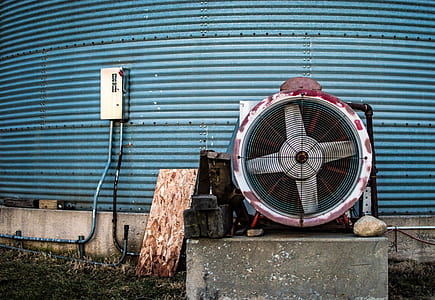 white and red air condenser on rock thumbnail