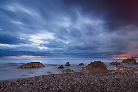 photography of water near rock thumbnail