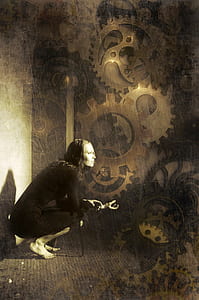 woman wearing gray long-sleeved dress inside a mechanism thumbnail