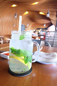 clear glass mason jar on top of brown wooden surface thumbnail