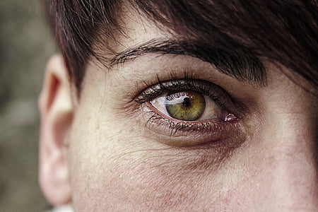 shallow focus photography of person's right eye thumbnail