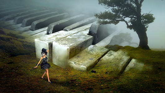 woman in black dress on green mountain thumbnail