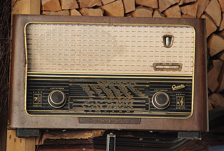 brown transistor radio on brown surface thumbnail