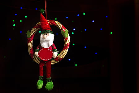 Santa Claus hanging on wreath illustration thumbnail