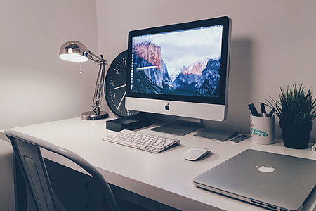 Studio office desktop with computer keyboard, lamp and mouse thumbnail