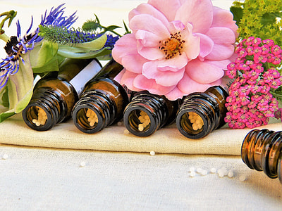 pink flower on glass bottles \ thumbnail