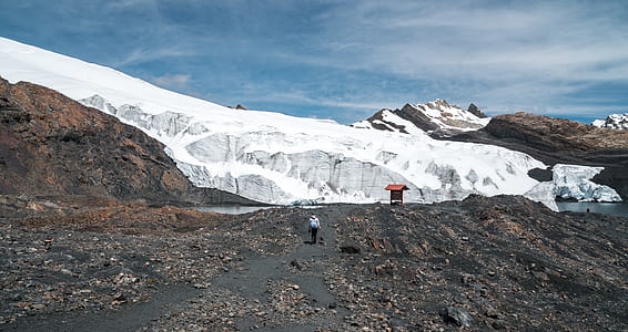 man walking across the mountain thumbnail