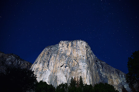 gray mountains under starry sky thumbnail