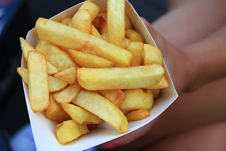 person holding box of French fries thumbnail