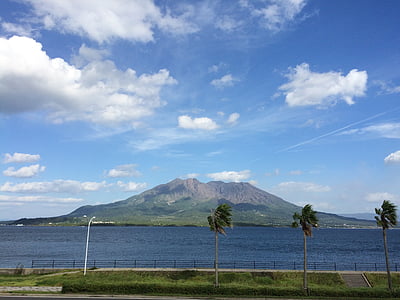mountain surrounded by water thumbnail