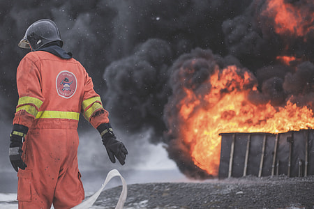 firefighter near burning premises thumbnail