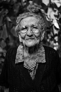 grayscale photo of smiling woman thumbnail