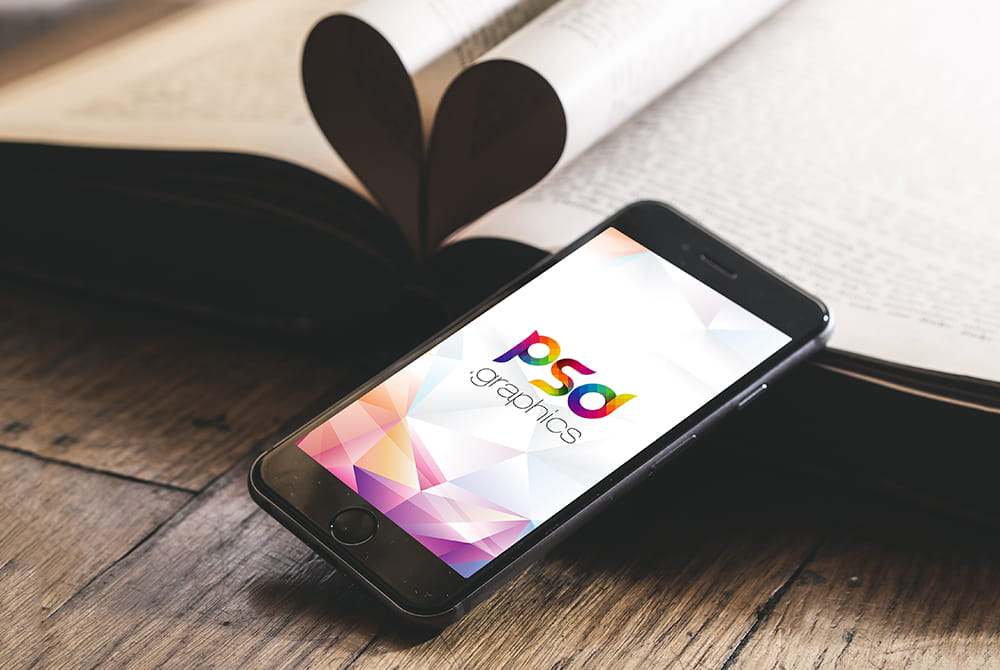iPhone on Wooden Table Mockup Free PSD psd file
