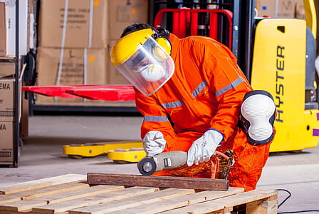 man holding brown angle grinder thumbnail