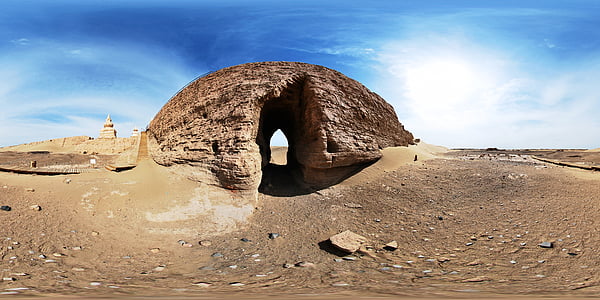 brown rock formation under blue sky thumbnail