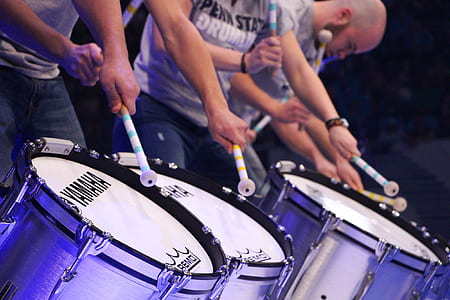 men playing bass drums thumbnail